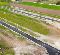 Built road on land designated for housing in Amadeho Kračany, Kostolné Kračany.