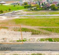 Plots - housing in Kostolné Kračany on Amadeho Kračany Street, green area.
