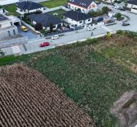 Aerial view of plots - housing in the town of Voderady, surrounded by modern houses.