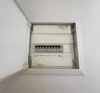 Electrical distribution box in a 3-room apartment with individual switches and descriptions.