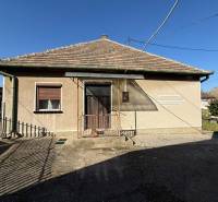 A family house on Malá Street in Svätý Peter with a brick roof and a yard.