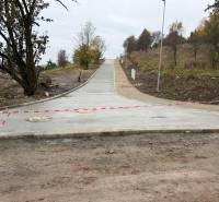 Building plot in Podbreziny Háje in Liptovský Mikuláš with a newly completed road.