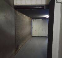 Garage in Bratislava-Ružinov on Pri strelnici with a dark floor and lighting.