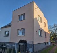 A family house on Kpt. Nálepku Street in Trebišov with a white facade and a garden.