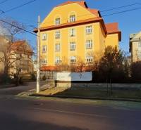 Yellow building with a sloped roof on Brnianska Street, Bratislava - Old Town.
