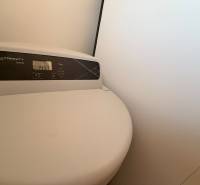 The display of the Trinity Home device in the family house shows a value of 1457.