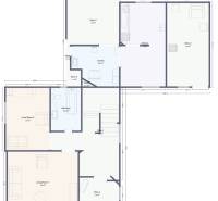 The floor plan of the family house shows the layout of the rooms, including the kitchen and living rooms.