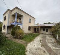 A family house on Gaštanová Street in Vinica with a landscaped walkway and exterior.