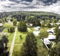 Kováčová offers green plots for living with views of forests and road access.