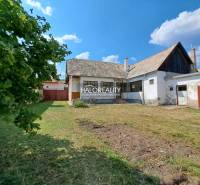 A family house in Zvolen with a lawn and an annex in the countryside.
