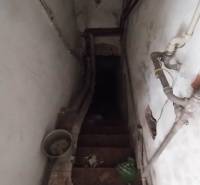 The old staircase leads to the basement in a family house on Štúrova Street.