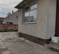 Family house on Štúrova Street with a terrace and a garden hose in the yard.