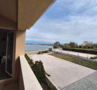 A view of the sea from the balcony in a 3-room apartment overlooking the coast.