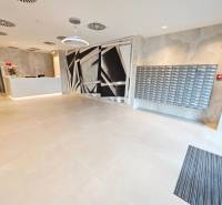 Reception with mailboxes and modern decoration in a studio apartment.
