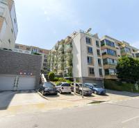 Building with a parking lot on Tupého Street in Bratislava - Nové Mesto.
