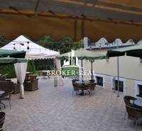 Terrace in Košice - North with seating under umbrellas, suitable for hotels and guesthouses.