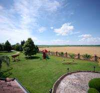 The garden with a children's playground at the villa on Park Street in Hviezdoslavov.