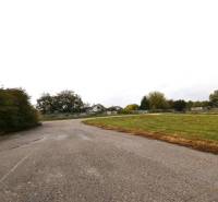 Asphalt road and grassy plots for commercial use in Galanta in Nebojsa.
