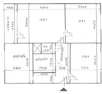 Floor plan of a 3-room apartment with a kitchen, bathroom, toilet, and loggia.