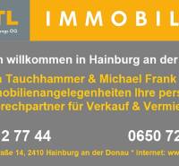 Real estate agency contact information board in Hainburg an der Donau.