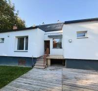 Family house on Industriestraße in Hainburg an der Donau with a terrace and lawn.