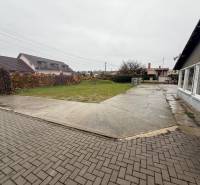 Commercial premises on Dolné Chlebany Street in Dolné Chlebany with a parking lot and a courtyard.