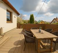 Terrace of a family house in Banská Štiavnica on 8. mája 2810/6A street with a wooden decor.
