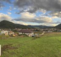 Panoramic view of the land - living in Margecany surrounded by hills and clouds.