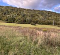 Green meadows with forests in the background, Margecany, ideal for residential plots.