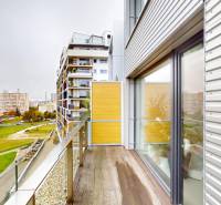 A balcony with a view of the housing estate in Bratislava - Petržalka, Rusovská cesta, from a 4-room apartment.