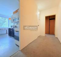 A spacious hallway leads into the kitchen of a 2-room apartment with a bright interior.