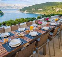 The rooftop terrace of the villa in the town of Bol with a stunning view of the sea and mountains.