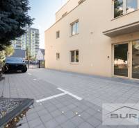 Parking lot at the apartment building on Železničná Street in Bratislava, Vrakuna.