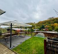 Terrace at the cottage on Trnkova Street in Bžany with a view of the surrounding landscape.