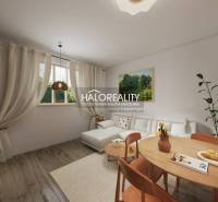 Living room in a three-room apartment with a wooden decor floor, light furniture, and decorative elements.