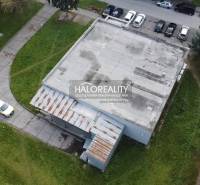 Building of commercial premises in Rimavská Sobota with parking lot and access road.