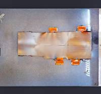 Floor plan of an office with orange elements and wood-patterned flooring.