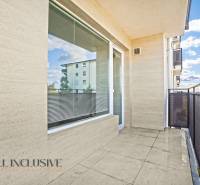 The balcony of a 2-room apartment in Panónsky háj in Dunajská Streda with a view of the surrounding architecture.