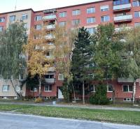 Apartment building on Hviezdoslavova Street in Senica with surrounding greenery and trees.