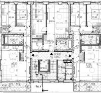 Floor plan of a complex with three apartments. It shows the layout of rooms of various sizes.