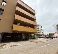 Apartment building on Sadová Street in Senica with parking garages.