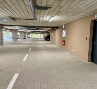 Parking lot with parking spaces and markings, tiled floor, in garages.