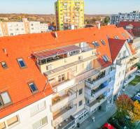Apartment building on Vajanského Street in Modra with a colorful facade and a red roof.