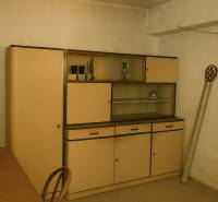 Vintage wardrobe and desk in the interior of a family house.