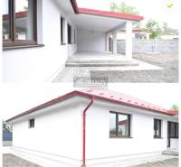 The family house in Závod features a white facade with a red roof and a canopy.