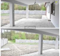 The terrace of a family house in Závod with a view of the fenced plot and greenery.