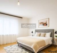 Bright bedroom with a double bed, nightstand, and curtains in a family house.