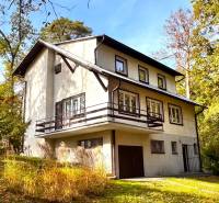 A cottage on Gazárka Street in Šaštín-Stráže surrounded by forest and grassland.