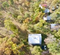 A cottage at Gazárka in Šaštín-Stráže surrounded by forest from a bird's eye view.