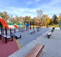 Outdoor gym and climbing wall at Gazárka in Šaštín-Stráže with benches.